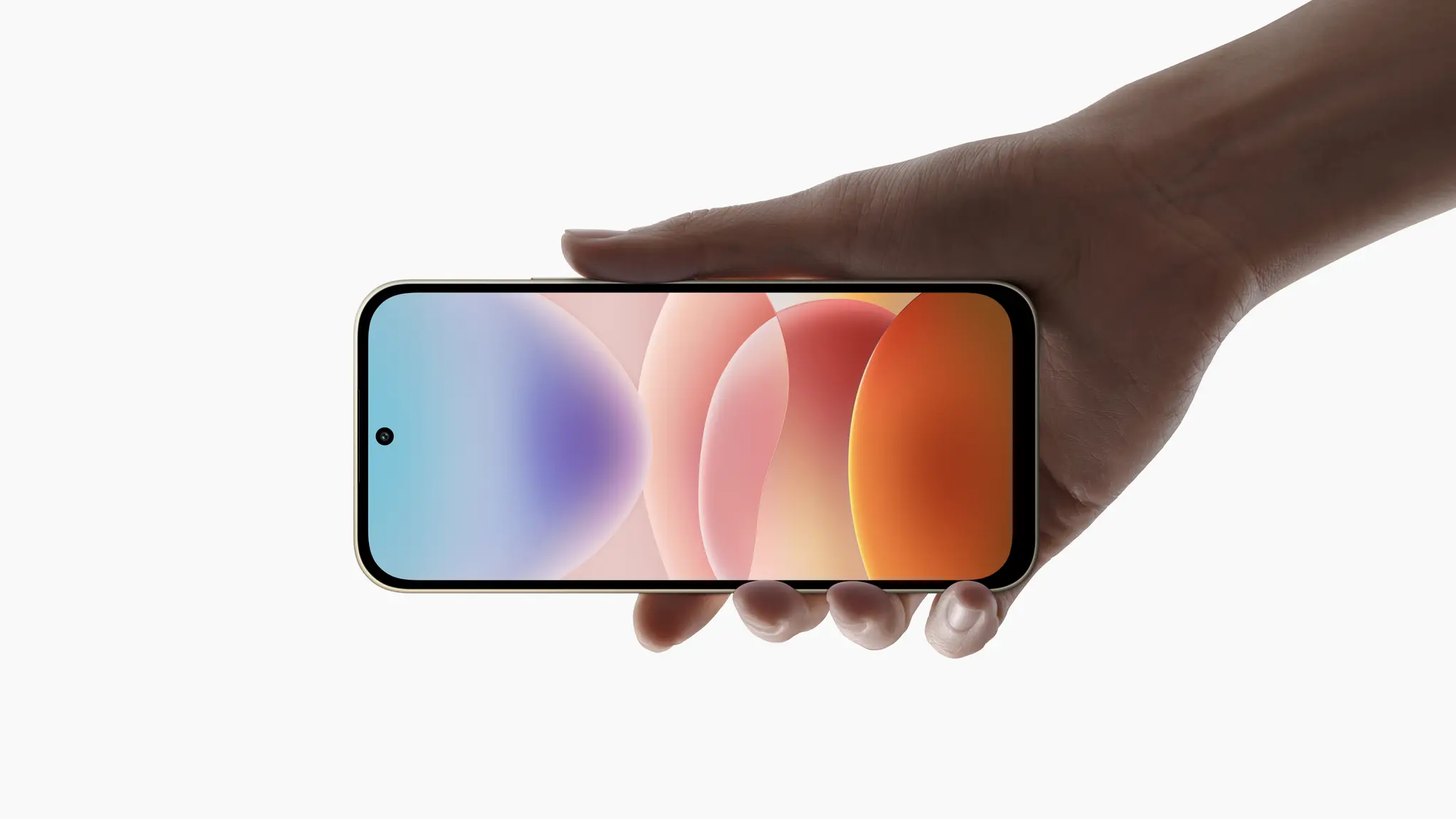 Hand holding a REDMI smartphone horizontally with its front display visible.